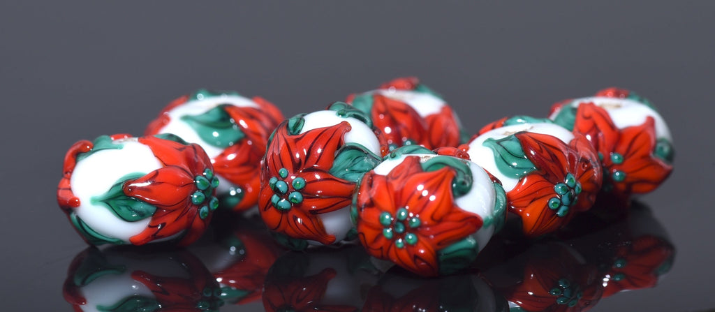 10707801 - Seven Red Poinsettia Christmas Rondelle Beads