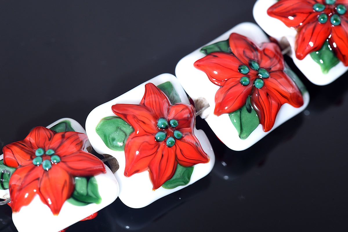 10707814 - Four Red Poinsettia Christmas Pillow Beads